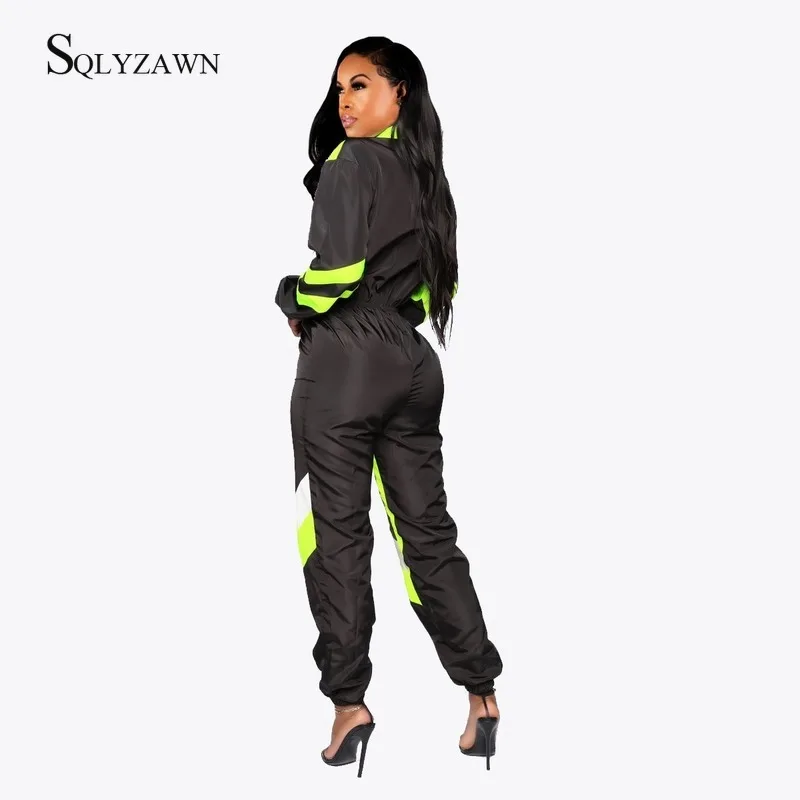 Женский спортивный комбинезон на молнии с длинным рукавом и цветными блоками