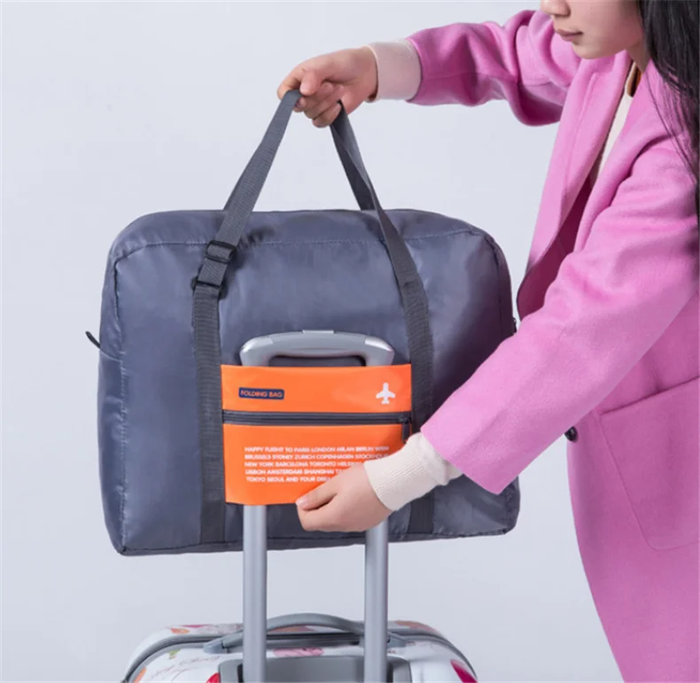 

Fashion WaterProof Travel Bag Large Capacity journey duffle Women Nylon Folding Bag Unisex Men Luggage Travel Handbags Wholesale