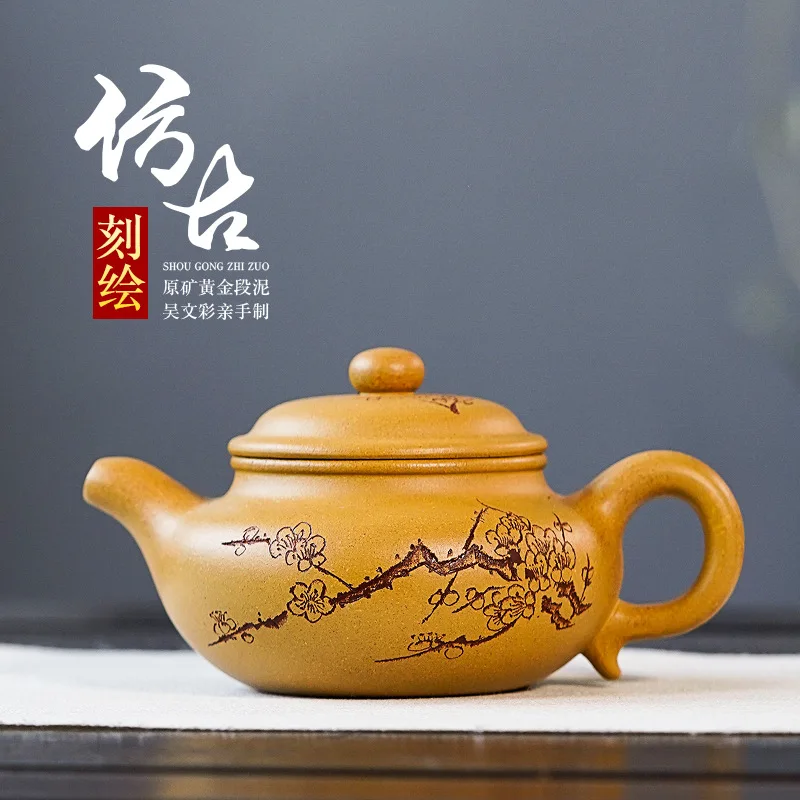 

Hot beautiful golden clay antique teapot factory direct sales handmade Yixing purple clay teapot customized make tea teapot