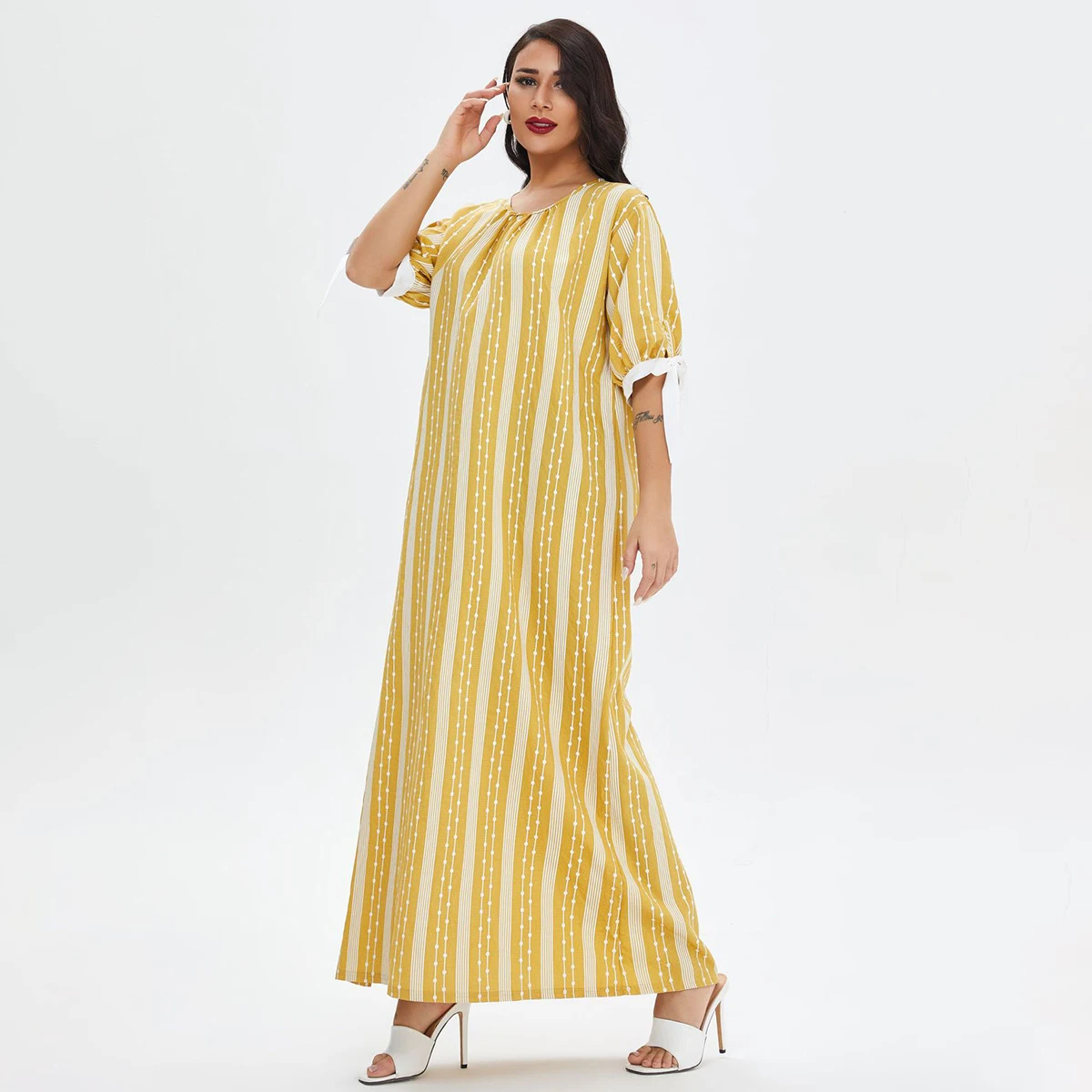 

Женская мусульманская одежда в полоску с коротким рукавом и бантом