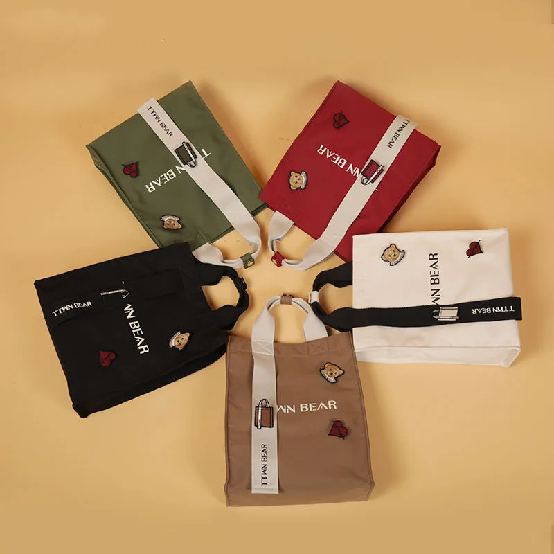 

Pure color canvas handbag women 2021 new literary college Mori series simple one-shoulder messenger bag