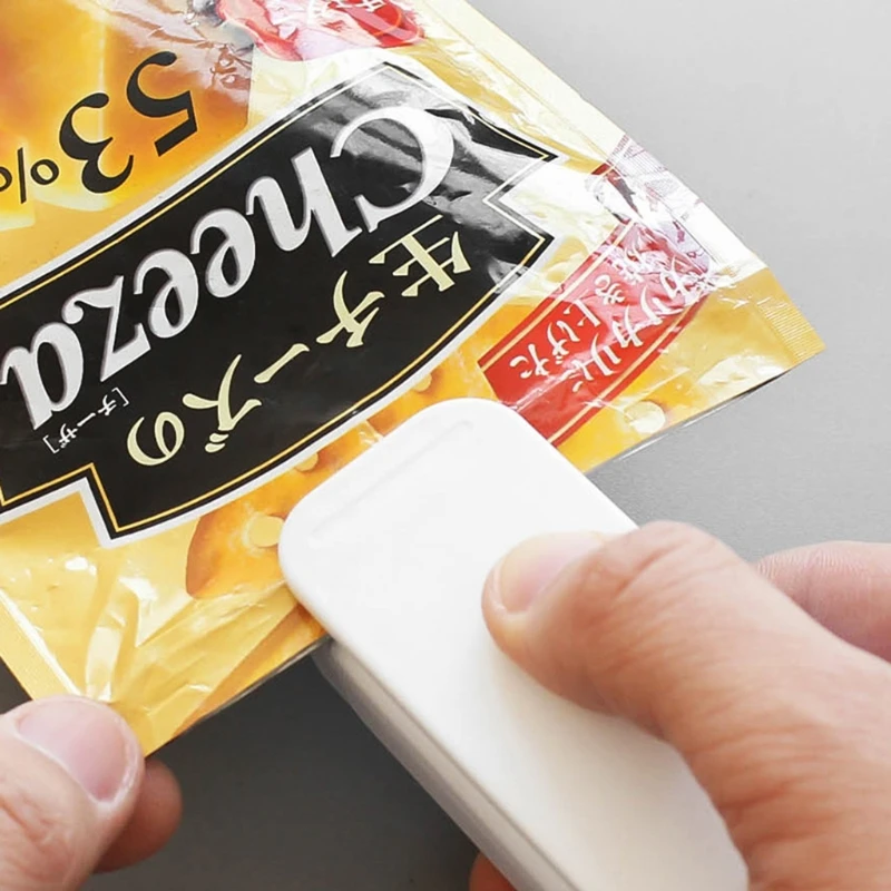 

Mini Sealing Machine Portable Snack Bag Heat Sealer Hand Press Sealing Machine for Plastic Bags Food Saver Storage