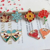 10pcslot plant flower crayfish snowflake shape enamel charms diy jewelry accessories kc gold color dripping alloy pendant
