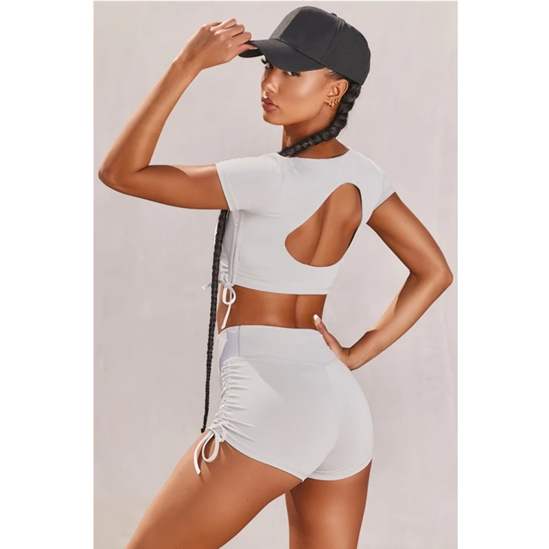 

Женский спортивный костюм с шортами, короткий топ с коротким рукавом и шорты, однотонный сексуальный тренировочный костюм для спортзала и ф...