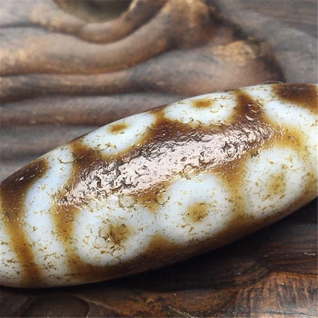 

1 ./, , , Dzi Seven Ten Eyes Totem