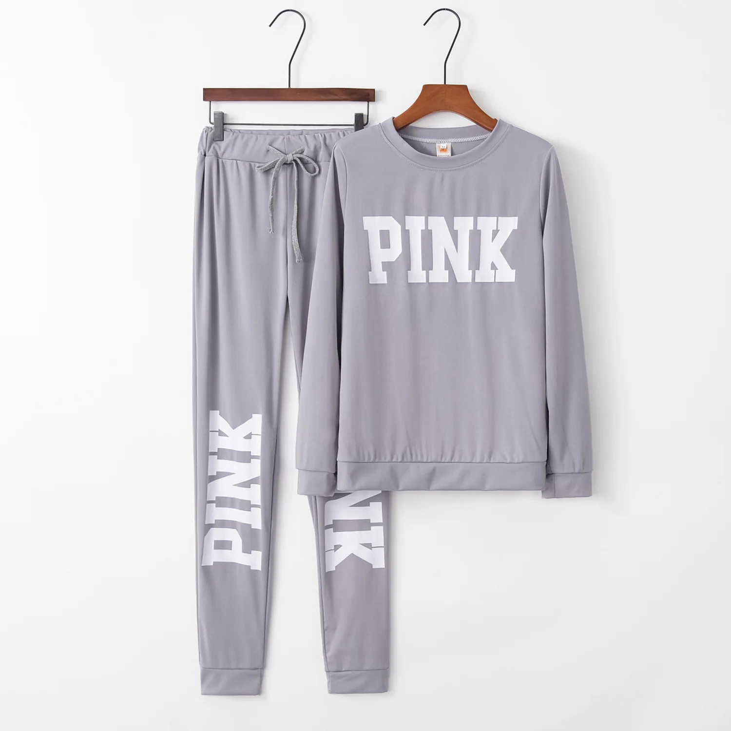 

Donsignet Women's Suit Fashion Spring and Autumn Temperament Round Neck Pullover Solid Color Letter Printing Slim 2-piece Suit