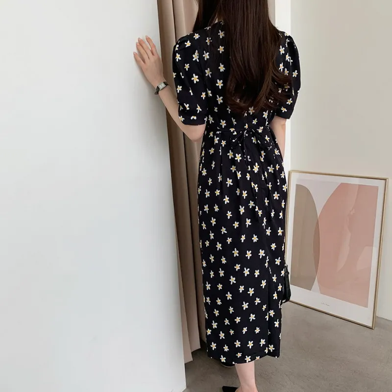 

VICONE Spring and summer floral round neck pile sleeve bandage dress