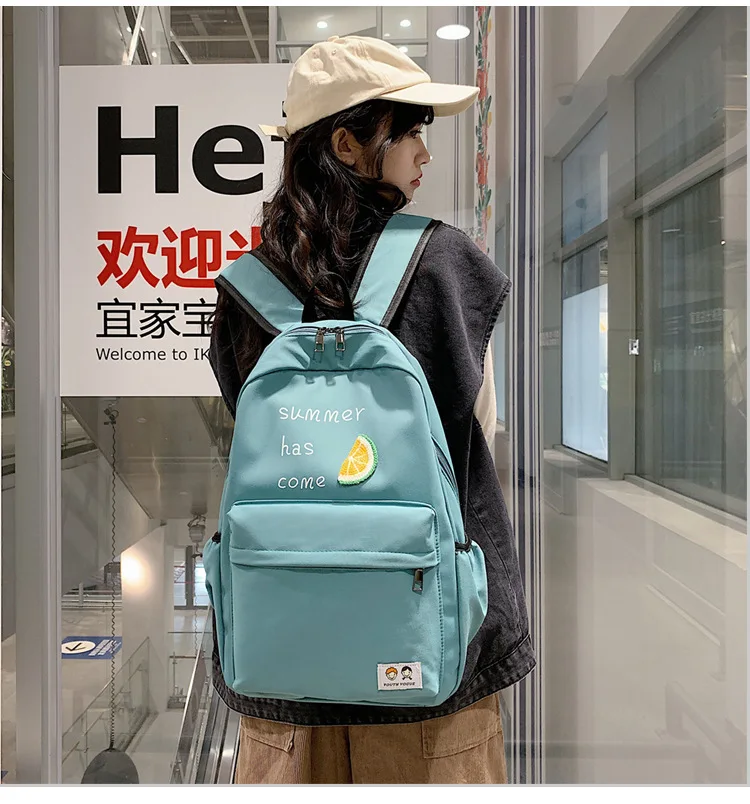 

New middle school backpack fashion backpack female leisure Korean large capacity waterproof wear backpack