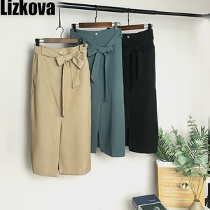 2020 Весенняя юбка миди женская черная бандажная юбка с высокой талией Элегантная юбка с разрезом спереди официальная Женская юбка RR8602