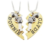 2 piecesset of gold and silver heart shaped foldable pistol pendant lovers necklace jewelry