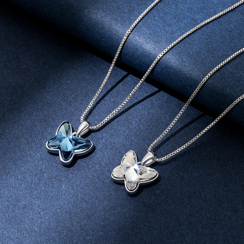 Женский ювелирный комплект из колье и серёг серебристого цвета