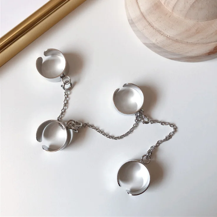 Кольцо женское вращающееся многослойное из металлического сплава на четыре