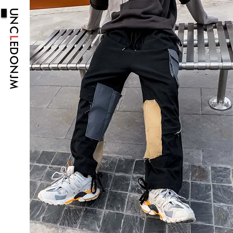 UNCLEDONJM Цвет блок брюки-карго для мужчин Уличная одежда в стиле хип-хоп с свободной