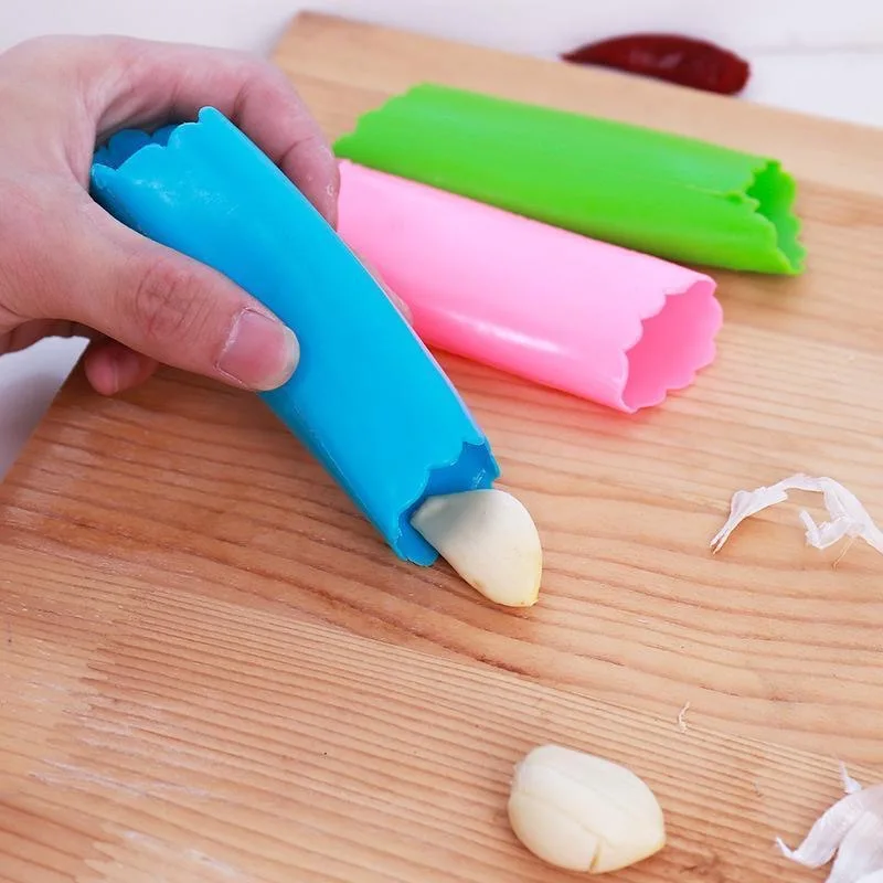 

Free Shipping Silicone garlic peeling artifact garlic peeling artifact manual squeezing garlic garlic crushing garlic grinder