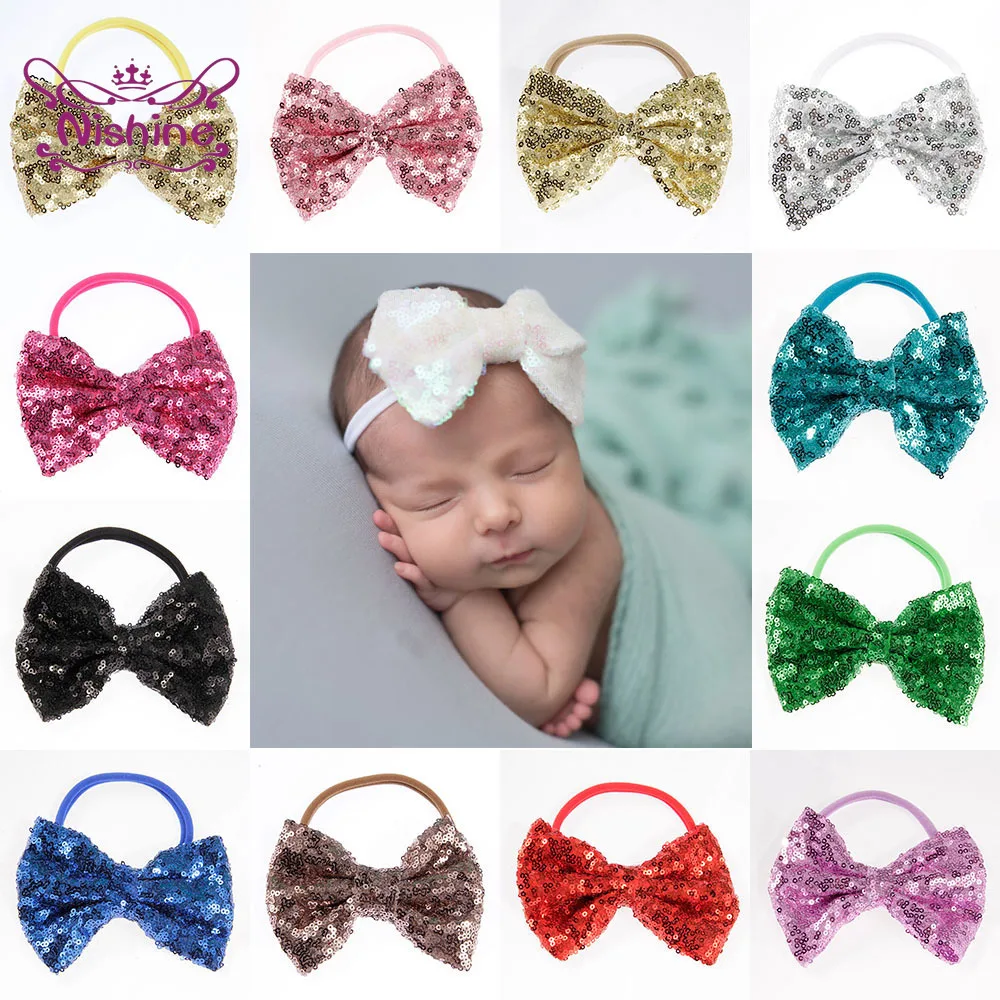 Повязка на голову для девочек нейлоновая однотонная с блестящим бантом большой