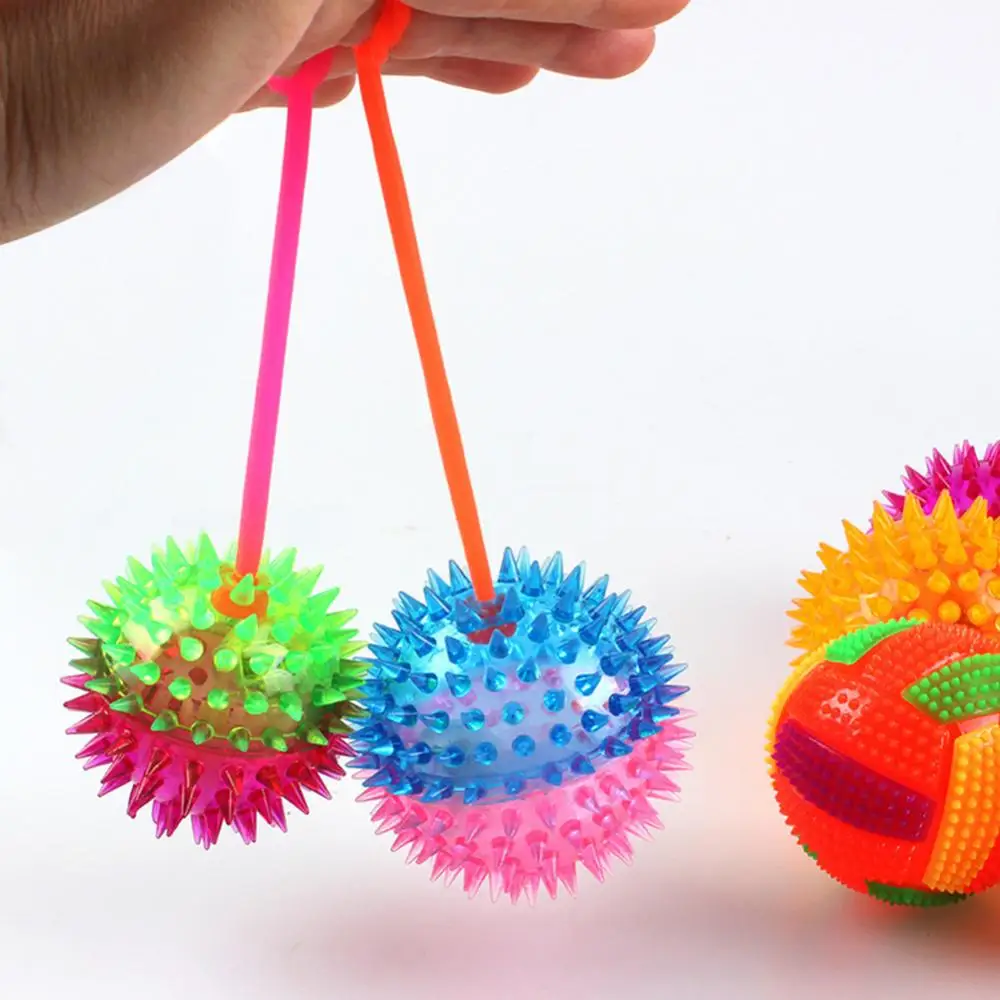 

LED Flashing Soft Prickly Massage Ball with Whistle Leash Squeaky Kids Prank Toy
