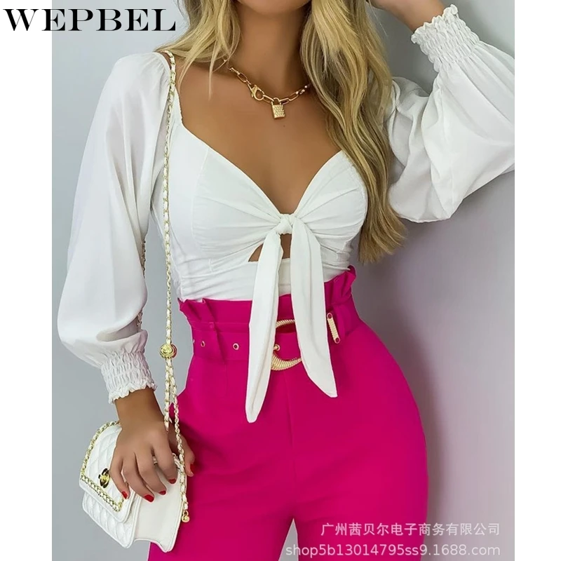 

Женская футболка с рукавами-фонариками, V-образным вырезом и открытой спиной