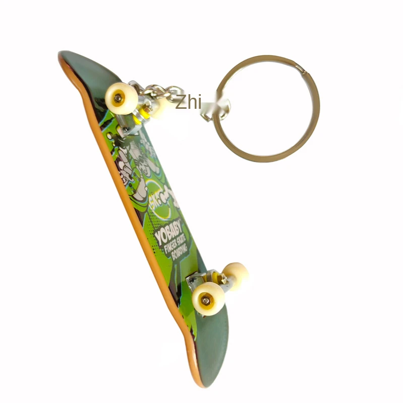 Explosive cartoon finger skateboard keychain chain tube carrying case pendant mini fingertip youth toy