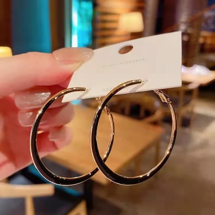 

Silver Pin Ear Buckle Exaggerated Large Round Needle Hoop Earrings High Sense of All-match Fashion White Oil Drip Earrings Trend
