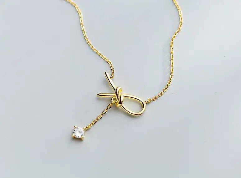 

100% 1pc real. Sterling Silver 925 Fine Jewelry Zirconia aaa+ white/gold hollow Bowknot Knot & Drop cz Pendant Necklace GTLX1897