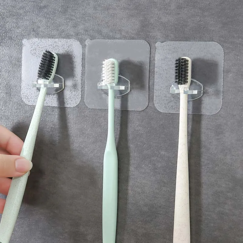 

2pcs No Hole Toothbrush Hooks Wall Mounted Transparent Toothbrush Holder No Mark Stick Toothbrush Shelf