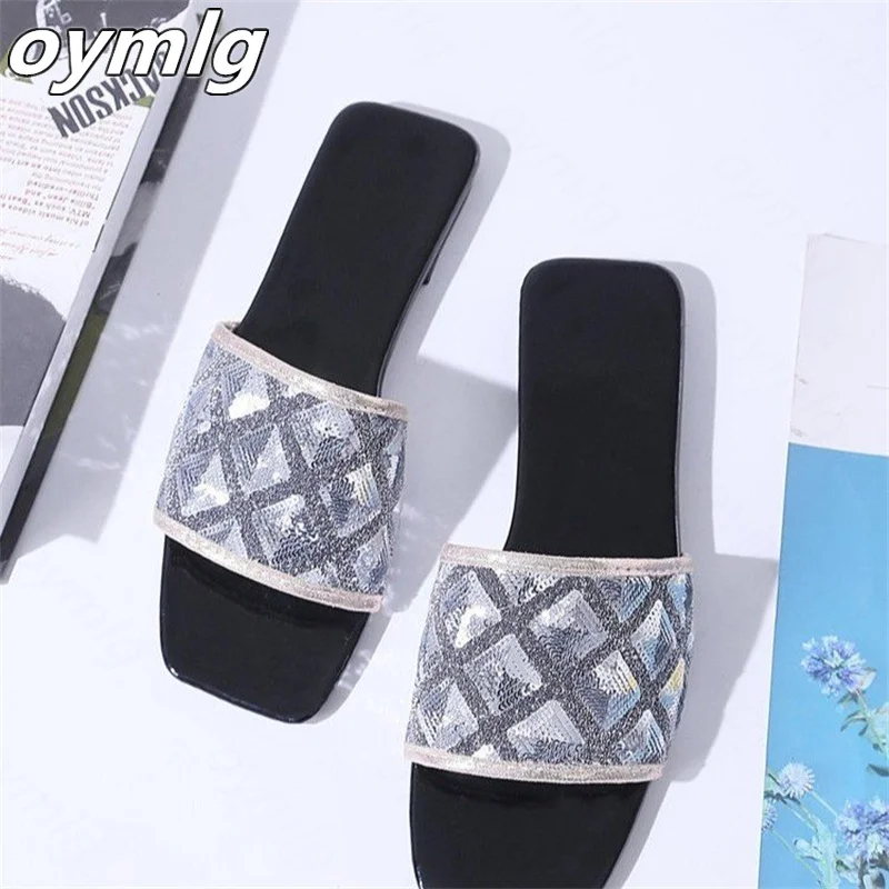 

Large size sandals and slippers women's 2022 spring and summer sequined flat shoes outer wear casual one-word beach drag 43 size