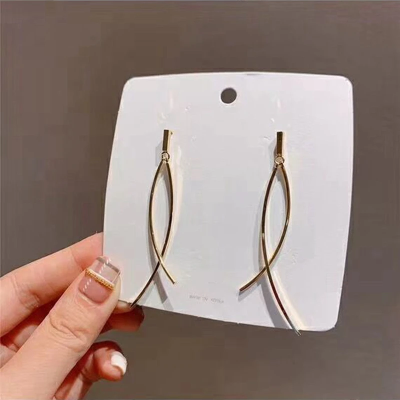 

Trendy Fashion Long Metal Strip Drop Earrings For Women Fashion Jewelry Sterling Gold Color Tassel Metal Wave Dangle Earrings