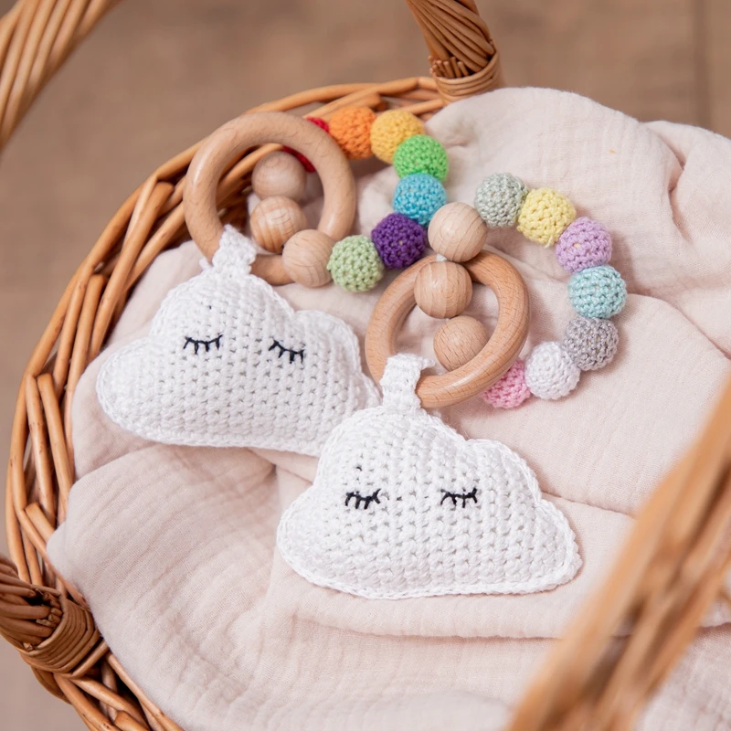 

Baby Toys for 0-12 Months Newborn Crochet Clouds Rattles Wooden Nursing Bracelet Rattles Toys Make Noise Beech Wooden Bed Bell