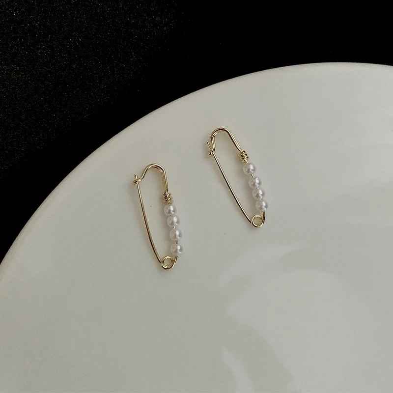 

Нишу дизайн Прохладный Творческий Pin Серьги с жемчугом Южная Корея Интернет знаменитостей; Изящная и маленькая морозный Стиль Стад Серьги-к...