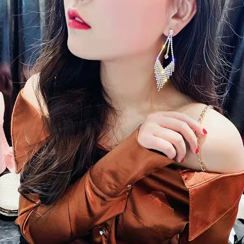 

Silver needle tassel earrings female temperament Korea exaggerated personality set diamond earrings pendant free shipping