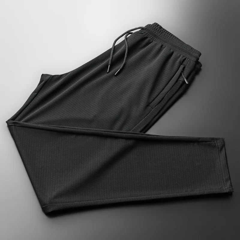 

2020 new summer breathable loose large casual pants men's trend air conditioning pants men's fashion ice silk Capris