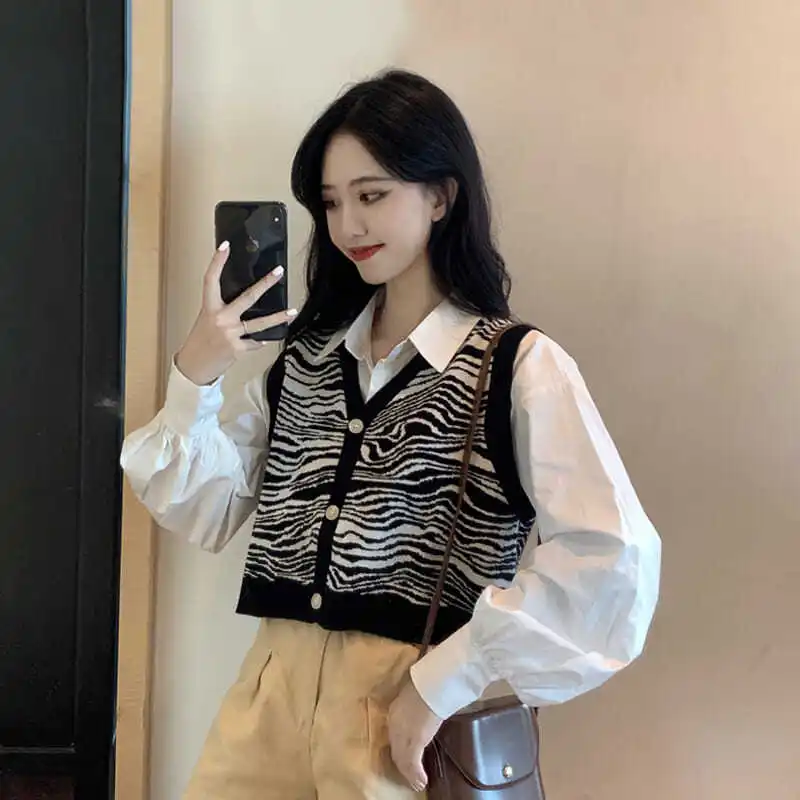 

Women's Knitted Vest Jacket Autumn And Winter Trendy Short Fashion Outer Sleeveless V-neck Color Matching Cardigan All-match