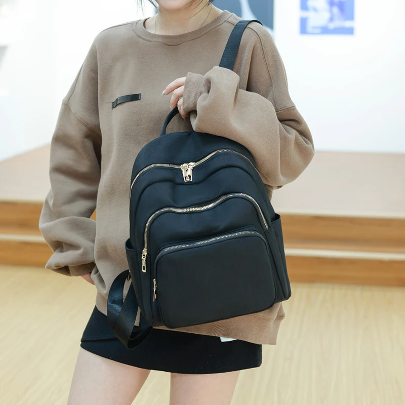 Повседневный Рюкзак из ткани Оксфорд для женщин черные водонепроницаемые