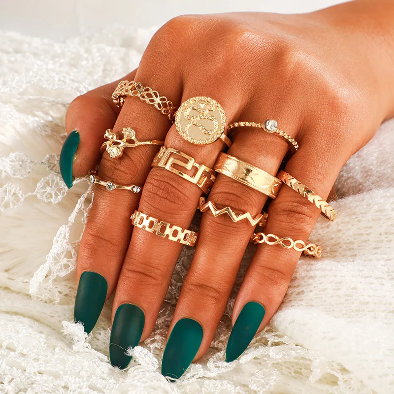 

Trendy fashion simple metal ring personality new snake-shaped resin geometric suit ring tail ring