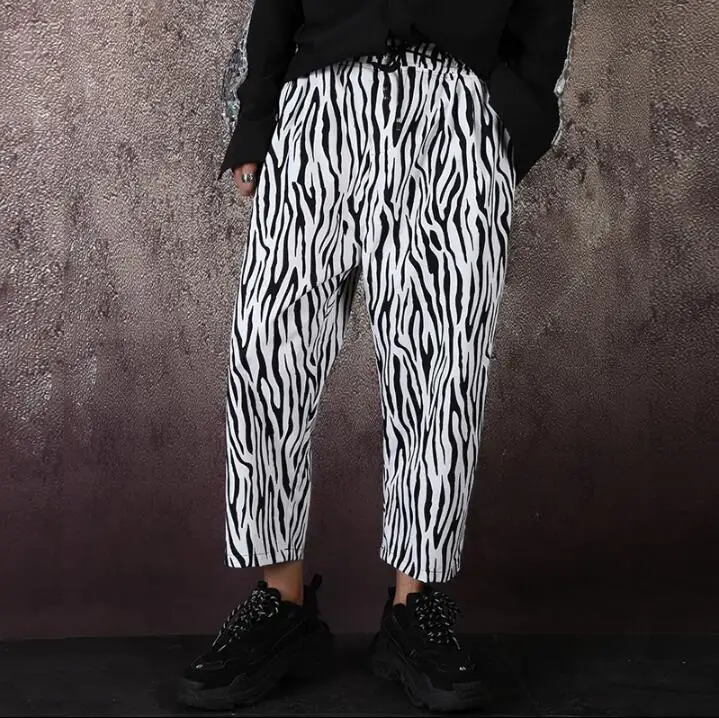

Fashion Men's Loose wide leg pants trend nine points pants zebra pattern elastic pants nightclub tide male hairdresser tide pant