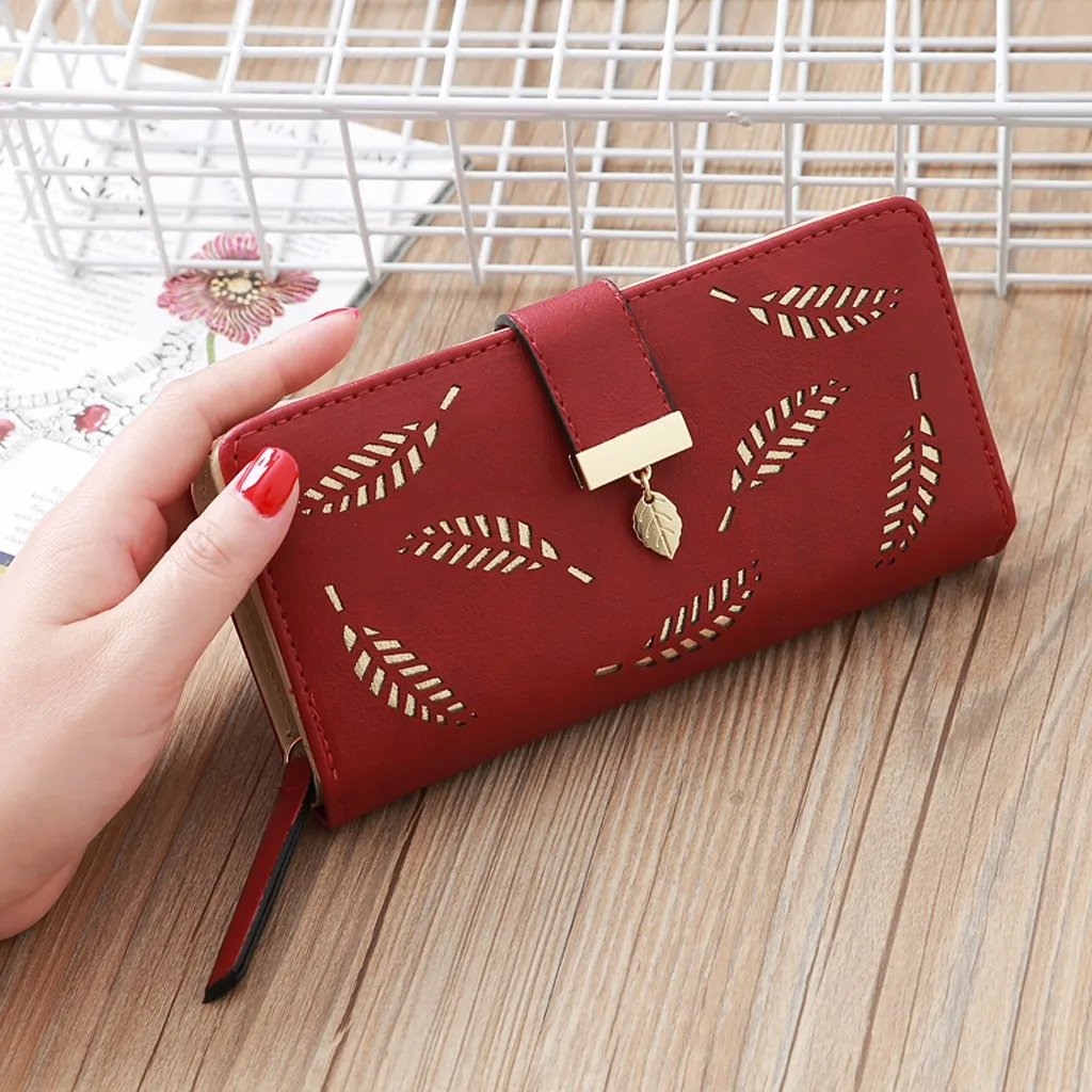Фото 2019 Leather Women Wallet Hasp Fashion Trend Solid Color Long Fringed Hollow Leaf Card portefeuille femme Багаж и сумки 2019 Leather Women Wallet Hasp Fashion Trend Solid Color Long Fringed Hollow Leaf Card portefeuille femme Багаж и сумки