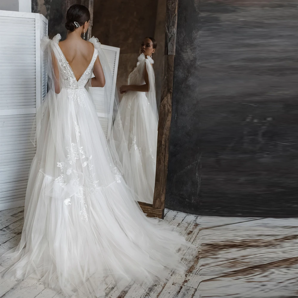 

Vestidos Charming Wedding Dresses Tulle Illusion Appliques V-Neck Sleeveless Backless Ball Bridal Gowns