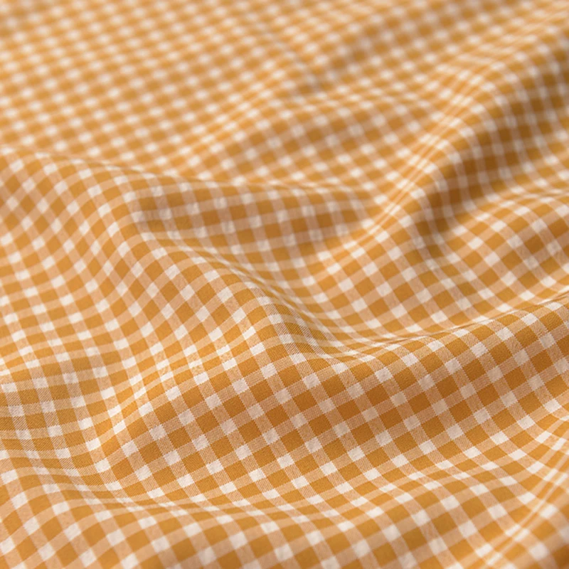 

50*140cm Old Turmeric Taperon Small Grid Fiber Fabric Dress Shirt Clothing Handmade DIY Tablecloth Baby Clothing Fabric