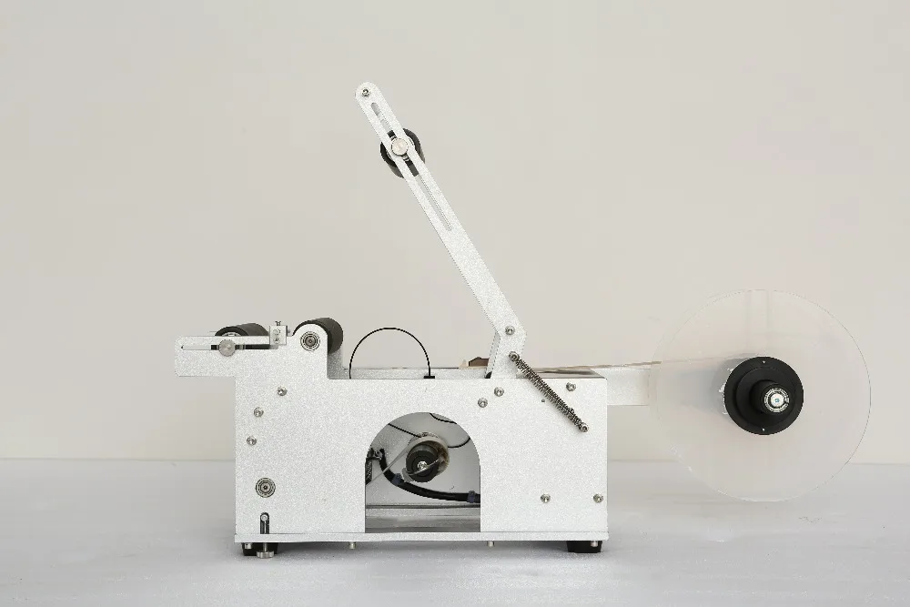 Этикетировочная машина этикетка Полуавтоматическая круглая бутылка для сока