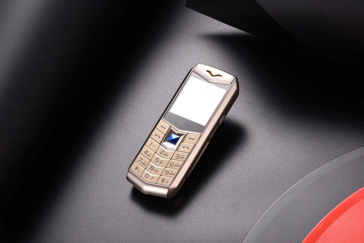 Мини Роскошный металлический корпус телефона с MP3 камерой Bluetooth фонарик детский телефон 1,5 ''мобильные телефоны
