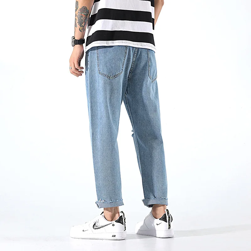 

2021 new hip hop jeans men's loose and holed casual sports pants trend Street Blue Capris