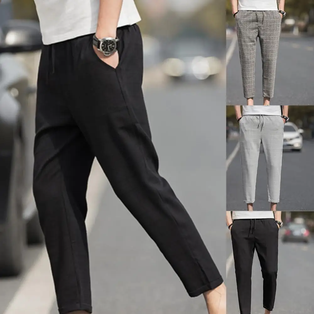 

Мужские клетчатые брюки-карандаш с эластичным поясом и карманами