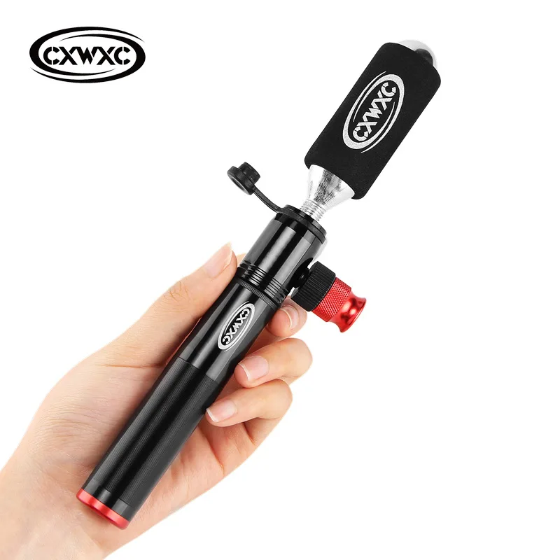 

Mini Portable Bike Pump CO2 Inflator Hand Pump For Bike Combo Valve Adapter Ball Air Cycling Bicycle Accessory