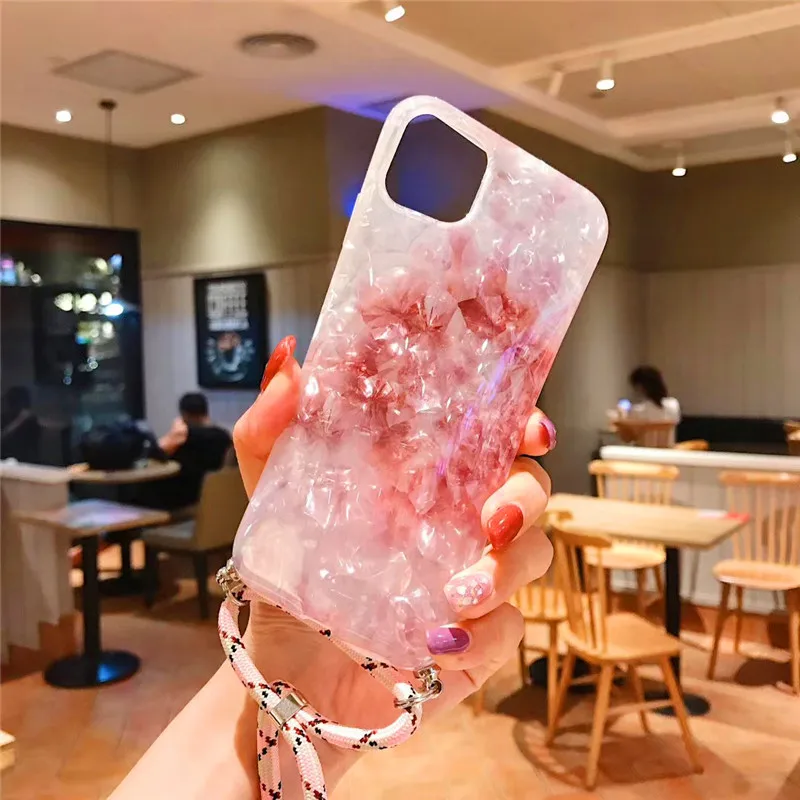 

Suitable foriPhone11pro mobilephoneshell red glass marble silicone soft shell new se silicone all-inclusive belt lanyard fashion