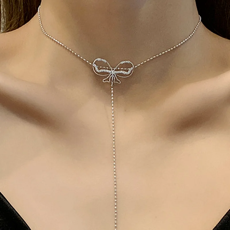 

U-Magical Wonderful Butterfly Pendant Necklace for Women Fashion Hollow Out Round Beaded Chain Long Tassel Necklace Jewelry