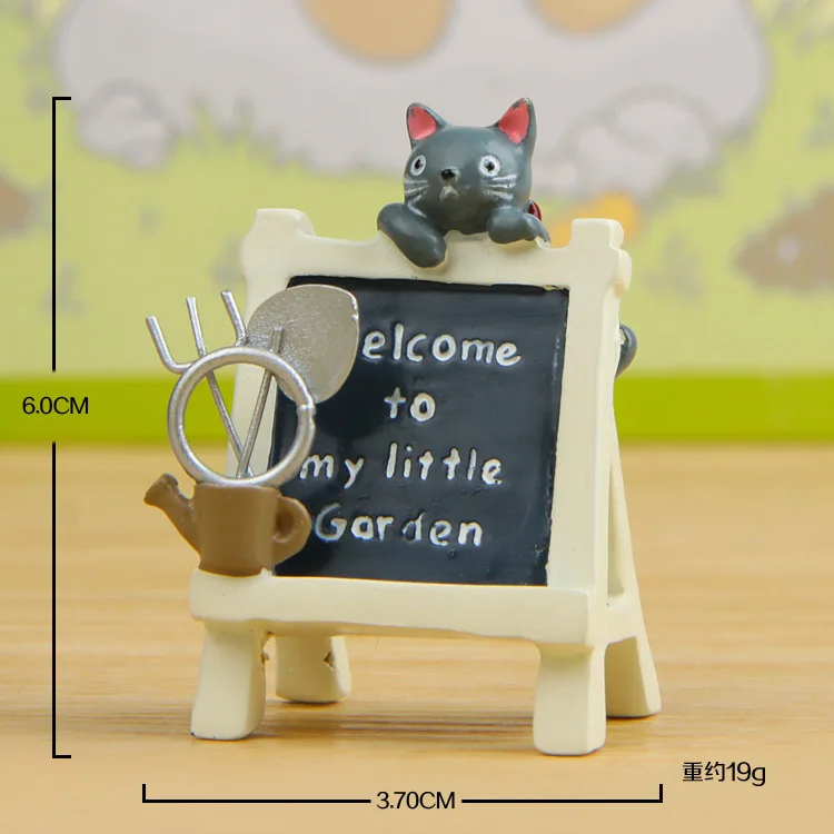 Черная кошка лежащая на билборде Лопата искусство фотография кукла | Игрушки и