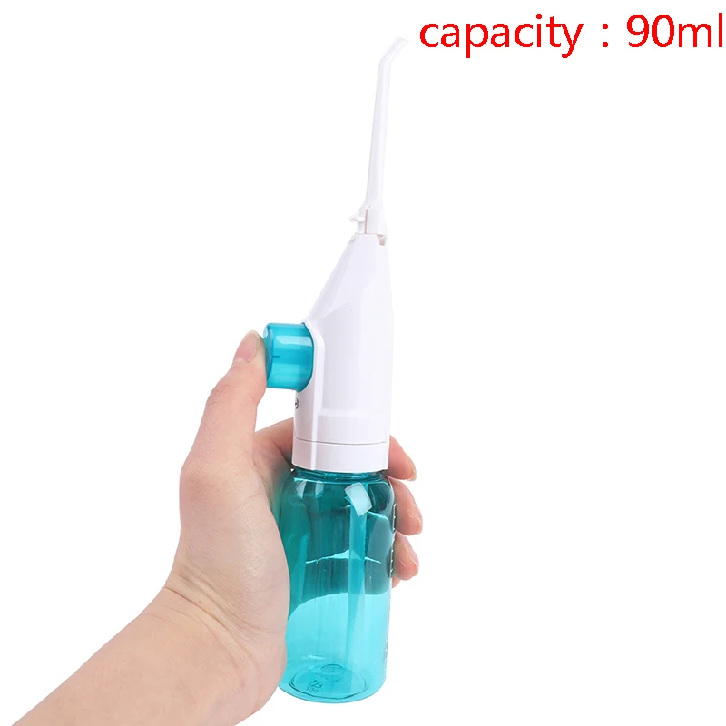 

Portable/Travel Water Manual Oral Irrigator With Nasal Wash Tip Teeth Cleaner