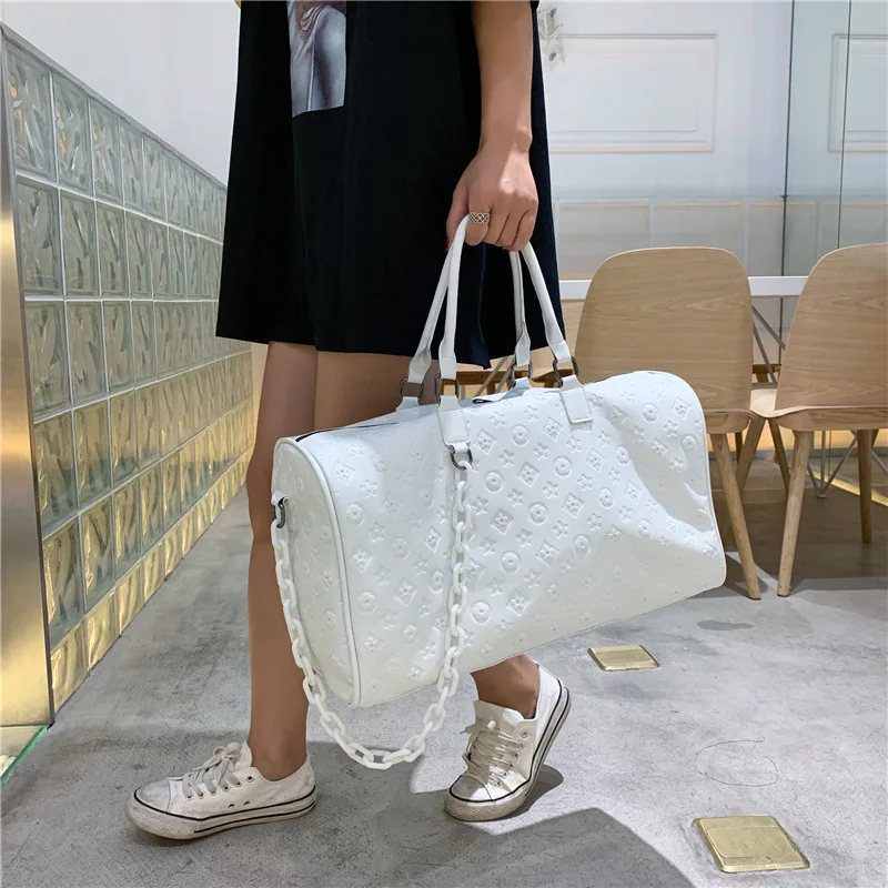 

Unisex PU Leather Travel Bag Female Portable Large Capacity Lightweight Luggage Bag Embossed Duffle Bag Women Travel Bags LGX142