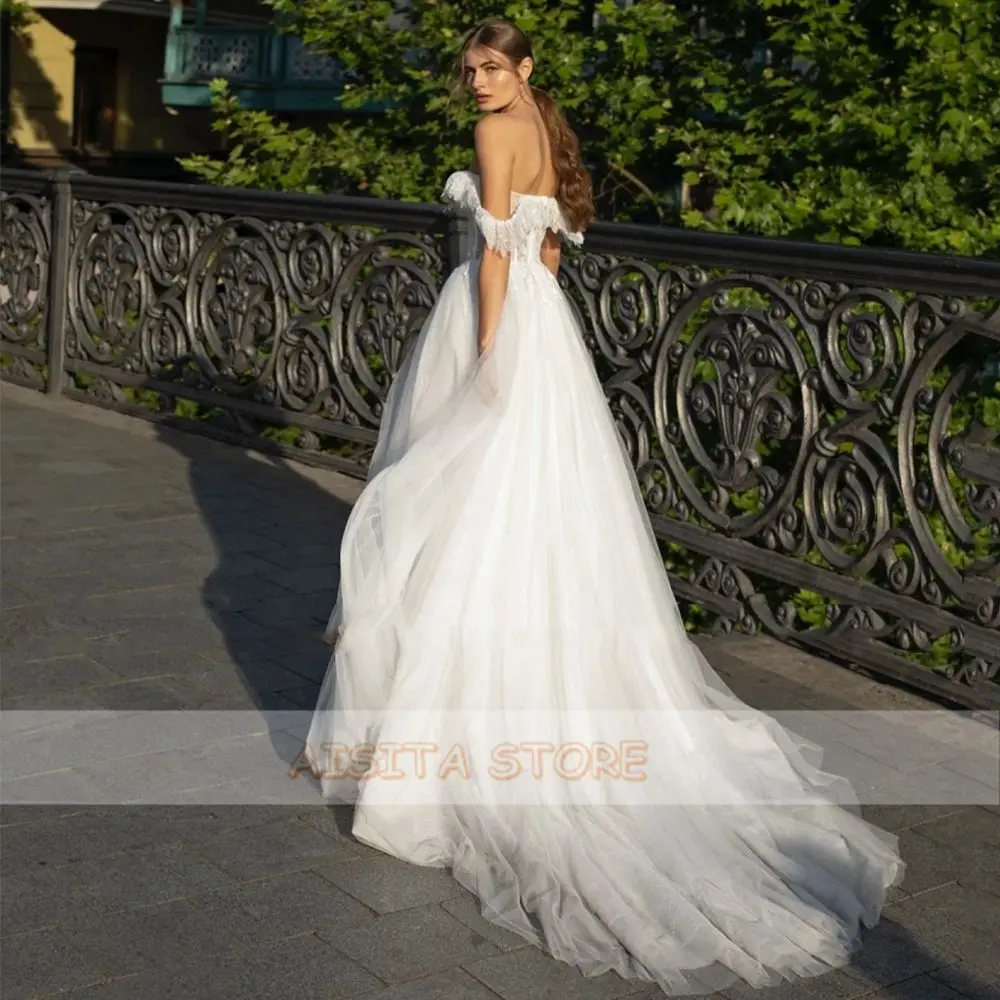 Princess Wedding Dresses 2021 Elegant Lace Appliques Off the Shoulder Sweetheat Tulle A Line Backless Court Train Bridal Gowns