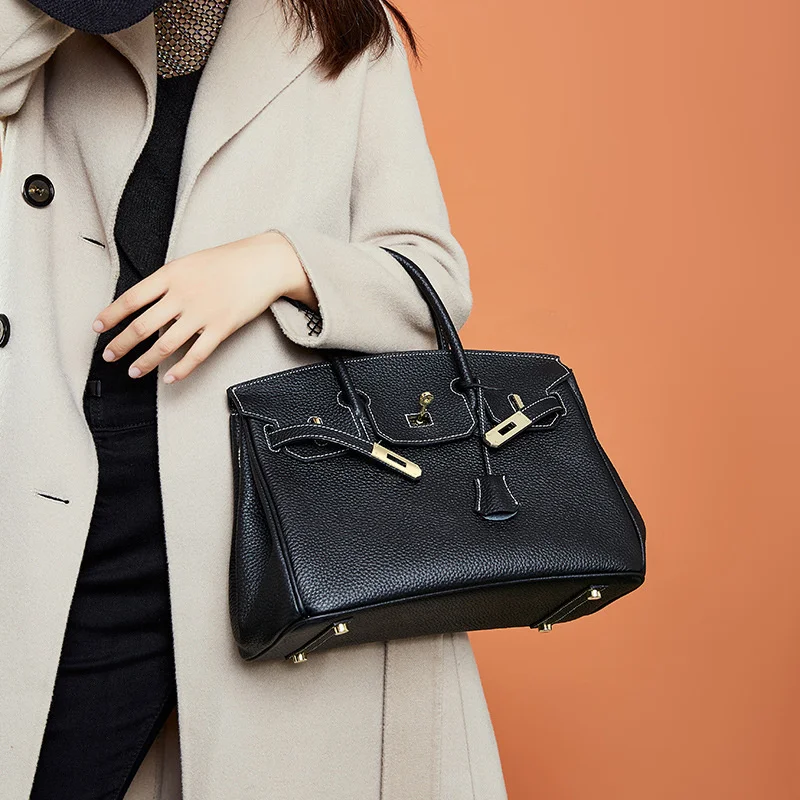 

Casual Retro Handmade Wax Line Fashion Leather Hand-held Women's Bag